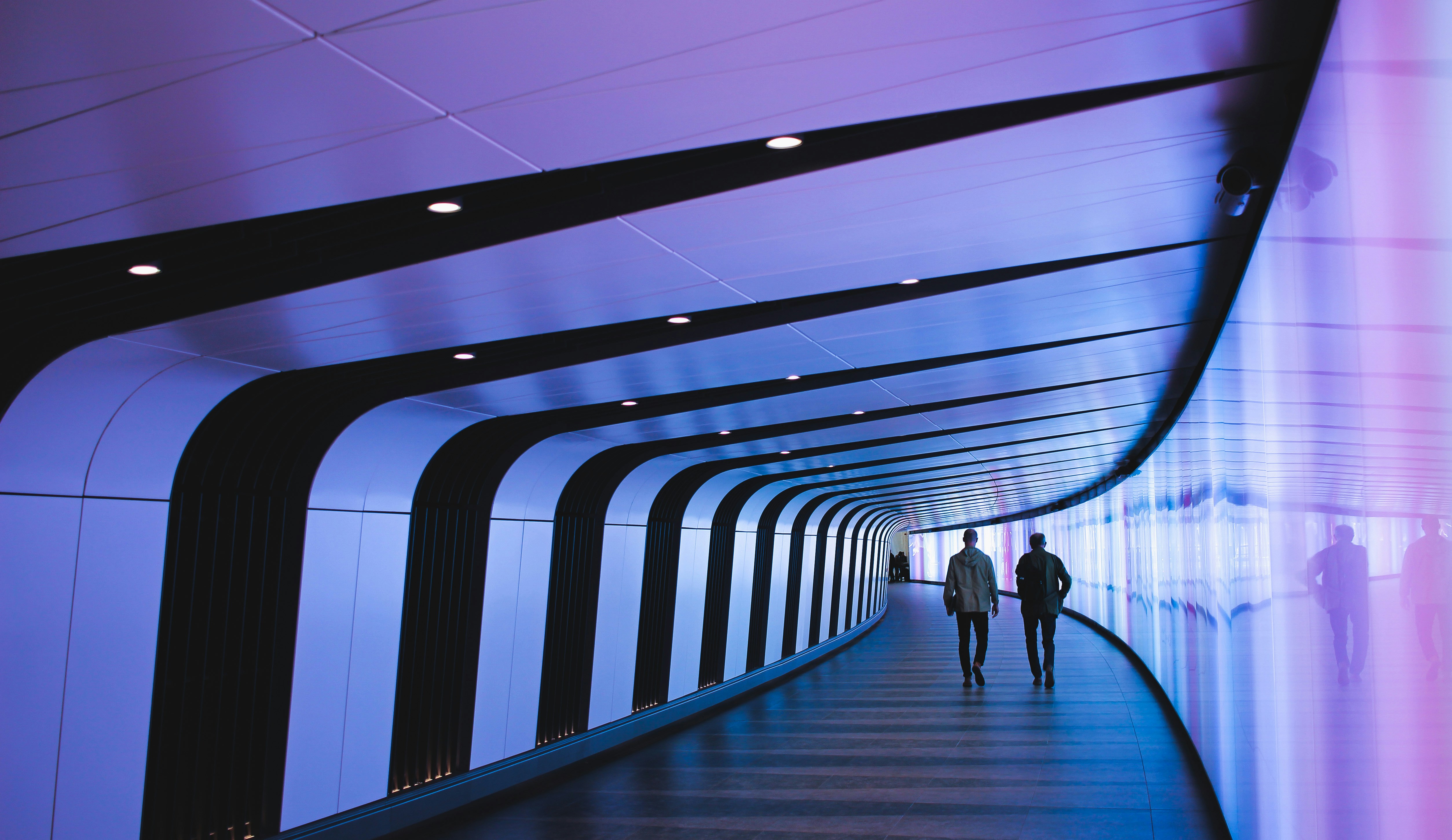 Modern futuristic tunnel representing our innovative approach and forward-thinking vision